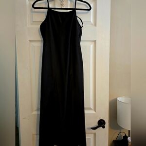 Weissman Charmeuse slip dress with side slitsStrappy crisscross back detail